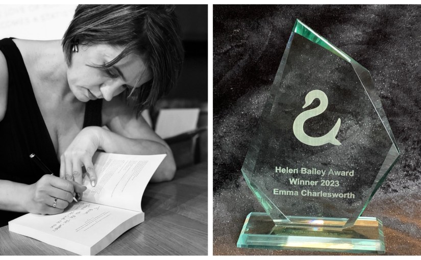 Picture of Emma Charlesworth signing her book and her award for her blog Life is a rollercoaster